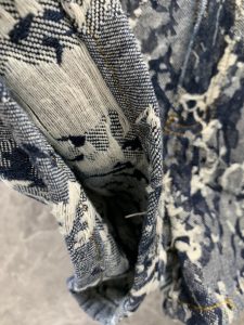 春夏新品花奔後袋真皮皮標女款高仿牛仔短褲