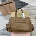 高仿精品MIUMIU繆繆Adventure Nappa羊皮革手提包棕色5BB159