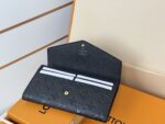 LV高仿長款沙拉錢包壓紋皮革設計黑色M82257典雅Monogram精品實用長夾