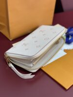 LV M61864 精品仿製Monogram Empreinte 浸染色壓花皮革拉鍊錢包