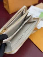 LV M61864 精品仿製Monogram Empreinte 浸染色壓花皮革拉鍊錢包