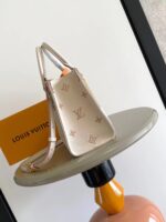 LV M14403 高仿OnTheGo 小号手袋｜Monogram Empreinte 皮革优雅链条包