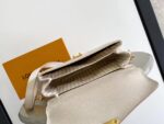 LV M14977 高仿Monogram Empreinte Pochette Métis MM 手袋时尚多功能包