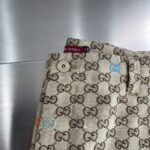 Gucci高仿25SS駝色深棕GG帆布短褲 切絲設計 時尚別致