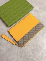 Gucci 精品仿製 男士手包 GG Supreme帆布 鏤空互扣式雙G細節 723320